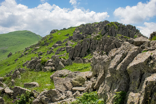 Green Landscape With Blue Sky And Clouds