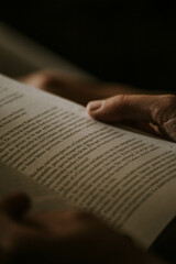 Naklejka premium person reading a book