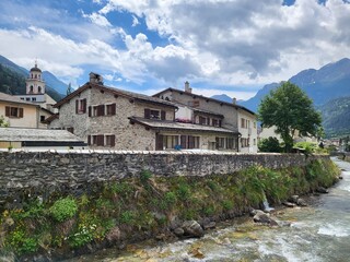 Fototapeta na wymiar House on the river in historical Poschiavo town in Canton Graubunden, Switzerland.