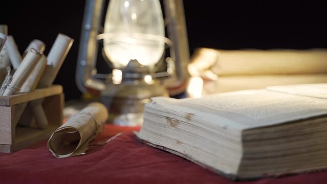 Medieval war sword and map. On Candlelight.
Strategy execution on the map in the historical period.
