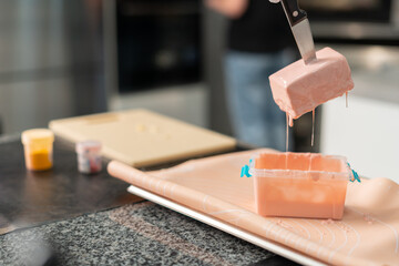young girl chef makes desserts. bakes sweets and cakes. makes blanks and prepares fruits for the filling. baking, dessert, sweets, complex cooking processes.