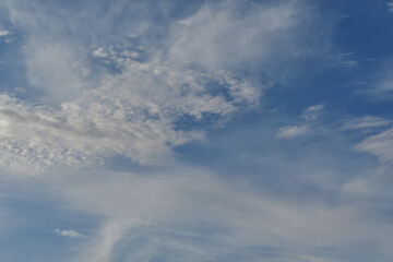 Fuzzy cloud on the blue sky, abstract background