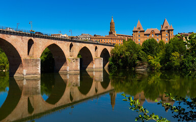 Obraz premium Montauban with bridge and river Tarn in Tarn-et-Garonne department, Occitanie region in southern France