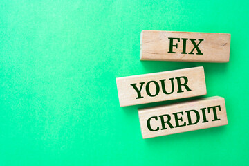 Fix your credit words on wooden blocks on green background.