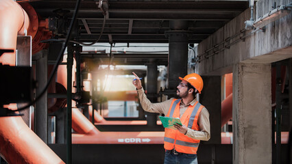 Engineer under checking the industry cooling tower air conditioner is water cooling tower air...