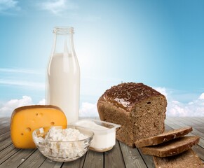 Jewish holiday Shavuot concept with dairy products on the desk