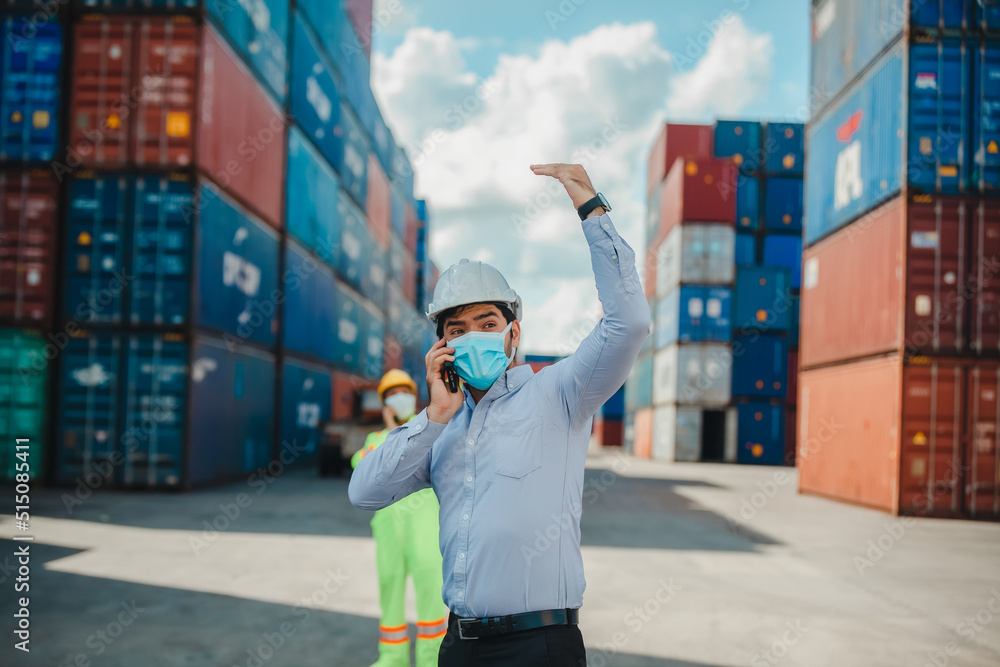 Poster foreman control loading containers box from cargo freight ship for import export, worker control ind