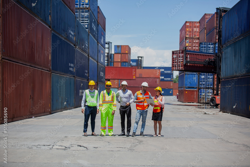 Poster manager standing and meeting with his staff in container depo company area. worker working checking 