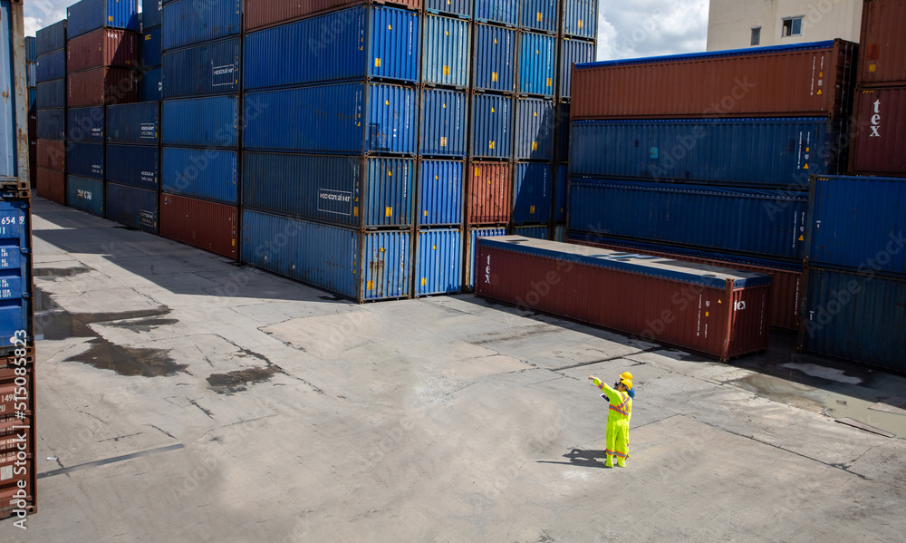Poster group workers people in safety uniforms and hard hats work at logistics terminal with many stacks of