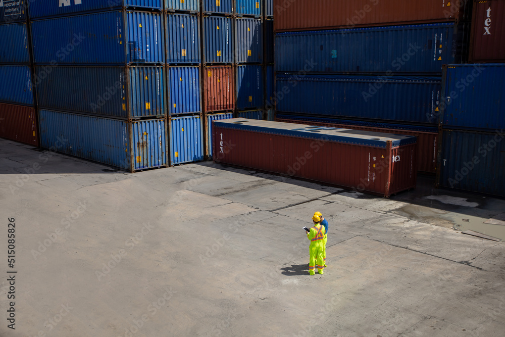 Aufkleber group workers people in safety uniforms and hard hats work at logistics terminal with many stacks of