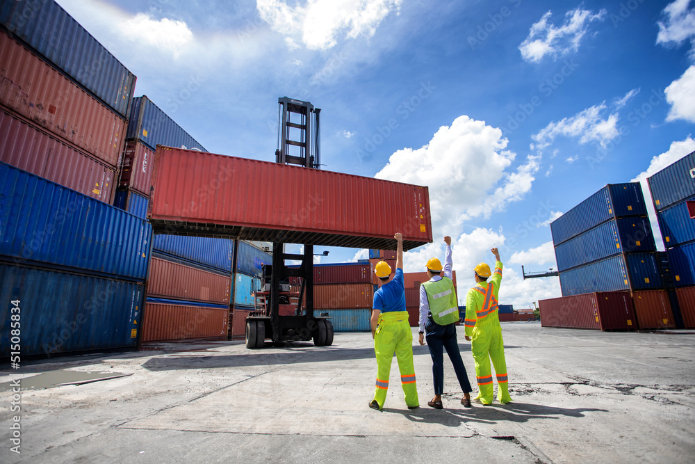 Poster manager standing and meeting with his staff in container depo company area. worker working checking 
