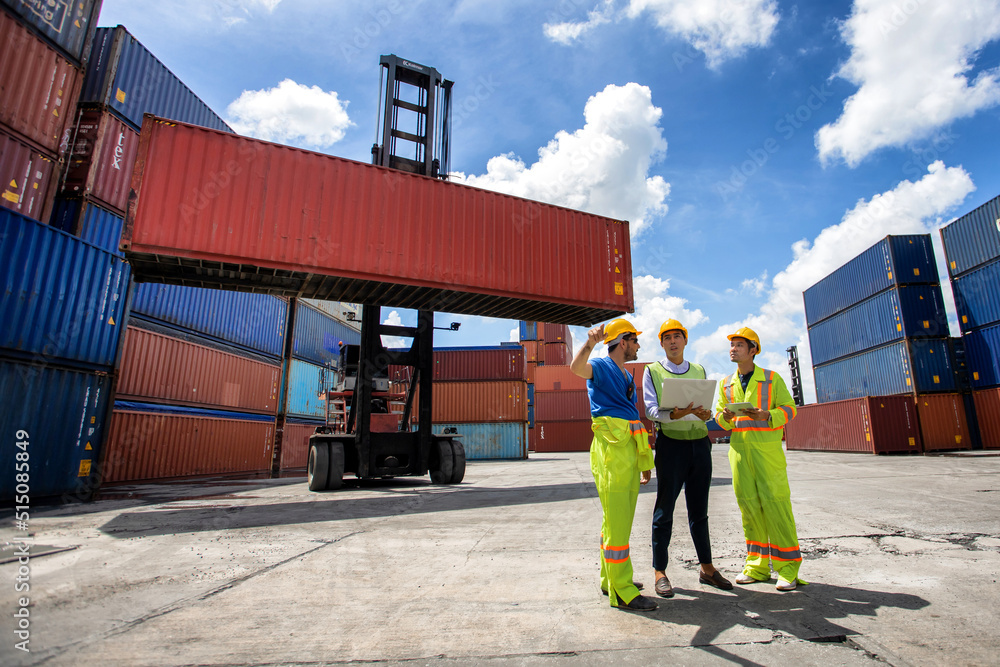 Poster group workers people in safety uniforms and hard hats work at logistics terminal with many stacks of