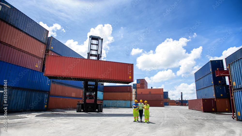 Aufkleber manager standing and meeting with his staff in container depo company area. worker working checking 