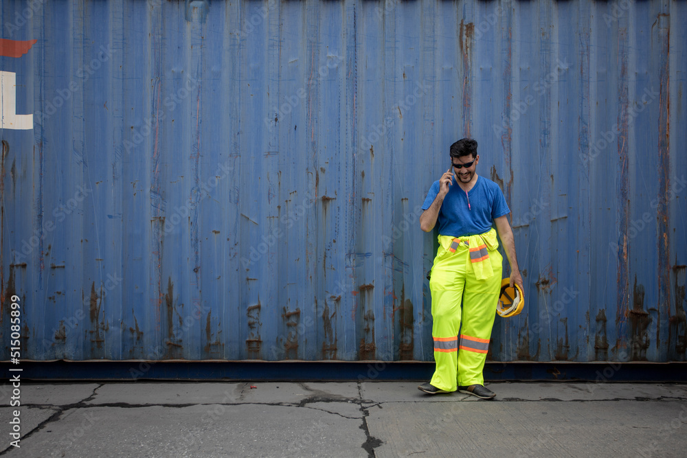 Aufkleber worker wearing safety helmet is taking rest and thinking of something while taking a break, foreman 