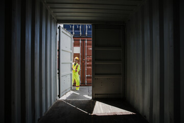 Foreman containers cargo inspector working. Cargo freight ship for import export. concept shipping, business and transportations.