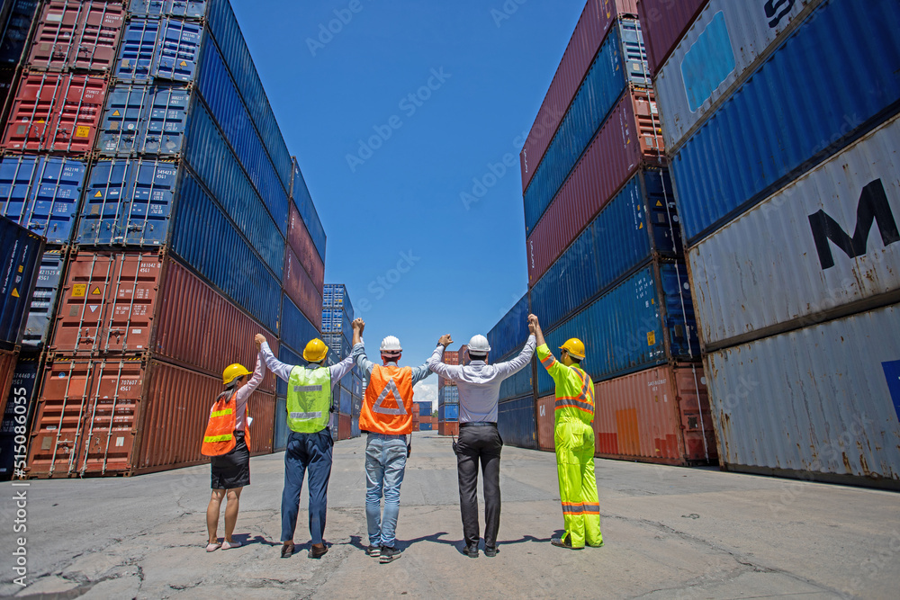 Aufkleber group workers people in safety uniforms and hard hats work at logistics terminal with many stacks of