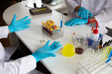 Team Scientists are experimenting with laboratories to compare vaccines to treat epidemics.