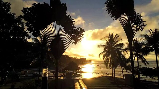 Time lapse from sunset at Ilheu das Rolas with sun refleting at the pool, in Sao Tome,Africa