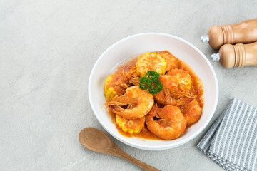 Udang Saus Padang (Shrimp in Chili Sauce), traditional food from Padang, Indonesia. Served in white bowl.

