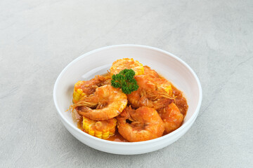 Udang Saus Padang (Shrimp in Chili Sauce), traditional food from Padang, Indonesia. Served in white bowl.
