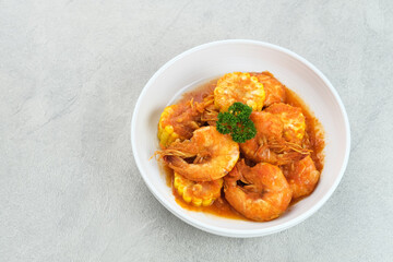 Udang Saus Padang (Shrimp in Chili Sauce), traditional food from Padang, Indonesia. Served in white bowl.
