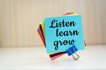 Text sign showing Listen, learn, grow
