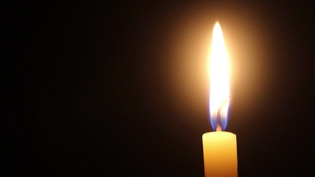 Candle light on black backround