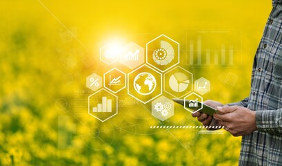 Farmer using digital tablet computer and modern interface icons, Business agriculture technology concept.