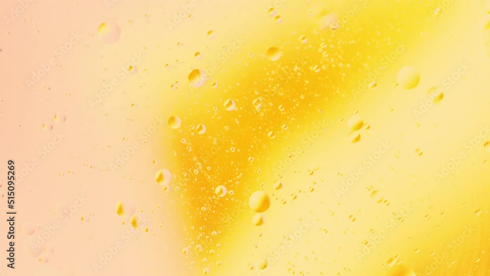 Aufkleber real close up oil bubbles in water rotation with color gradient abstract mixing background.