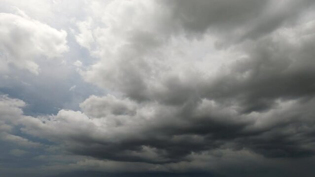 Timelapse Sky and black cloud. Dark grey storm clouds