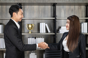 business success concept, Businessman And Businesswoman Shaking Hands. business people handshaking