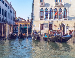 Fototapeta na wymiar Gondolas in Grand Canal in Venice, Italy