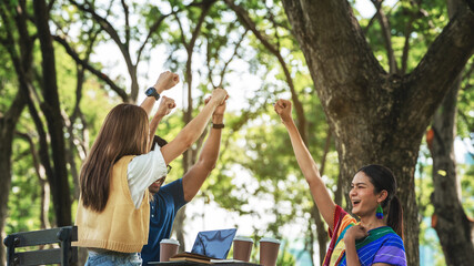 Naklejka premium trust partnership.Young happy friend partner people Trust cheerful hands up Successful group team work. Diverse LGBTQ culture students celebrating together. Group of people supporting each others.