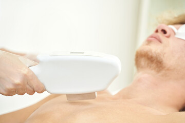 Laser hair removal treatment. Chest place. Clinic skin care procedure. Medical dermatology photo...