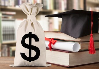 Saving money for college tuition fees, education concept, bags, a black graduation cap, a mortarboard or a hat. Creating a financial budget for a college student. - obrazy, fototapety, plakaty
