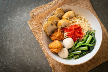 egg noodles with fish balls and shrimp balls in pink sauce, Yen Ta Four or Yen Ta Fo