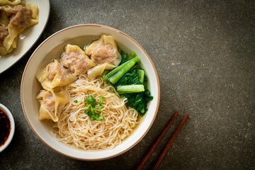 egg noodles with pork wonton soup or pork dumplings soup and vegetable