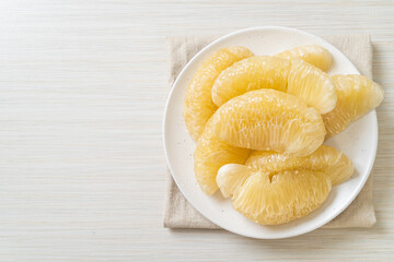Fresh peeled pomelo, grapefruit or shaddock