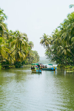 Tourists in boats watching the beauty of honnavar