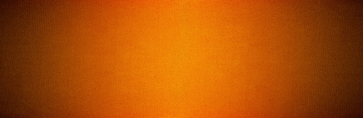 Dark orange brown black abstract background with light spot and space for design. Gradient. Bright. Metallic glitter effect. Web banner. Wide. Panoramic. Halloween spooky. Template.