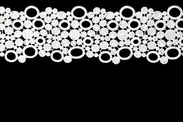 White lace with oval shapes isolated on black background horizontally. Copy space