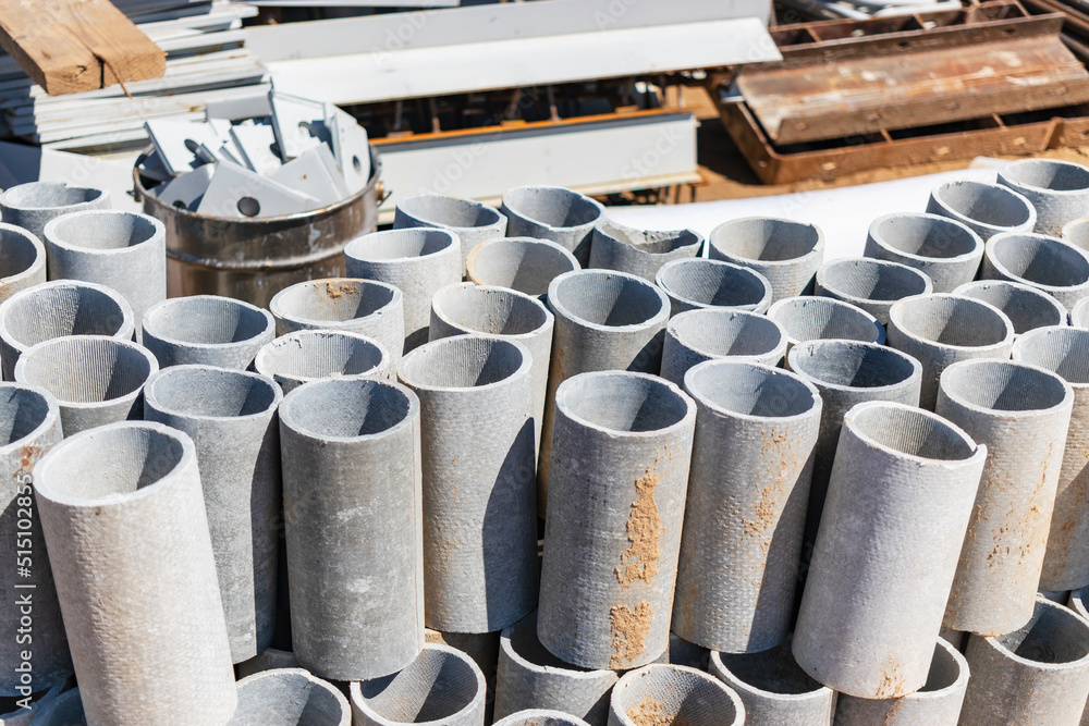 Poster building materials at a construction site. prepared materials and embedded parts for foundations at 