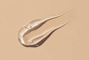 cosmetic smears cream texture on pastel beige background	
