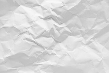 White crumpled paper texture background, clean white wrinkled paper, top view.