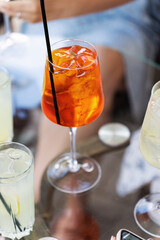 Aperol spritz cocktail on the dinner table. Summer lifestyle