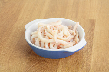 Marinated squid strips in the bowl