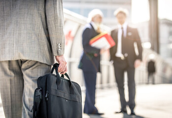 Senior businessmen on the street