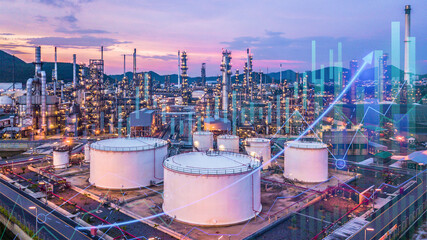 Oil refinery factory plant and oil storage tank with business graph analysis at twilight, Eoconomy...