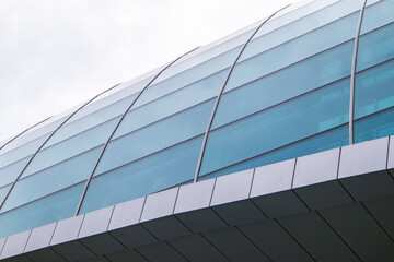 Fototapeta na wymiar Modern design of the glass and concrete roof dome, architectural construction concept, close-up