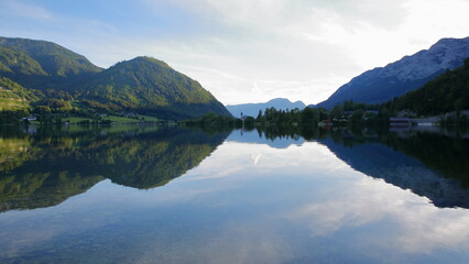 Fototapeta na wymiar Reflections on Grundlsee lake (Eastern part) with Zinken mountain in the background, Salzkammergut, Styria, Austria, Europe